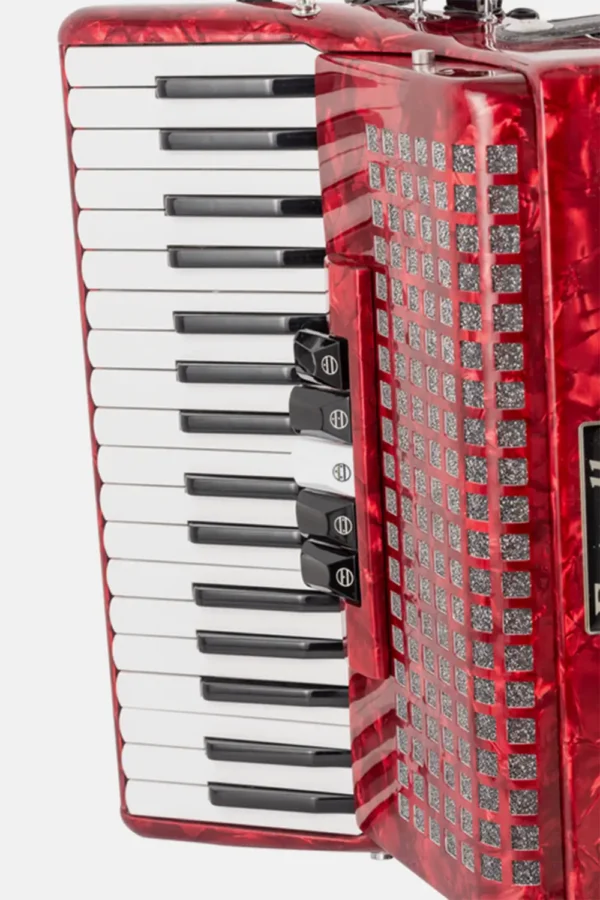 Detalle teclado acordeon estrella rojo 3472